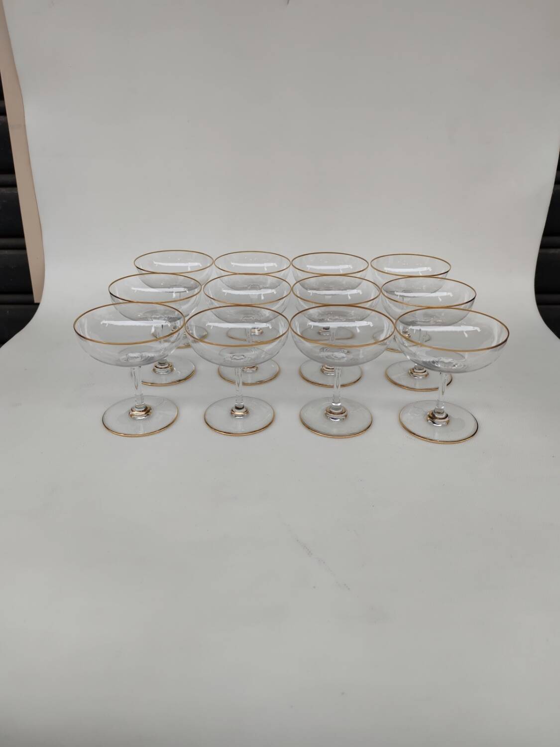 12 Baccarat crystal champagne coupes, circa 1900.