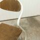 Atypical chair of the 70s metal and wood