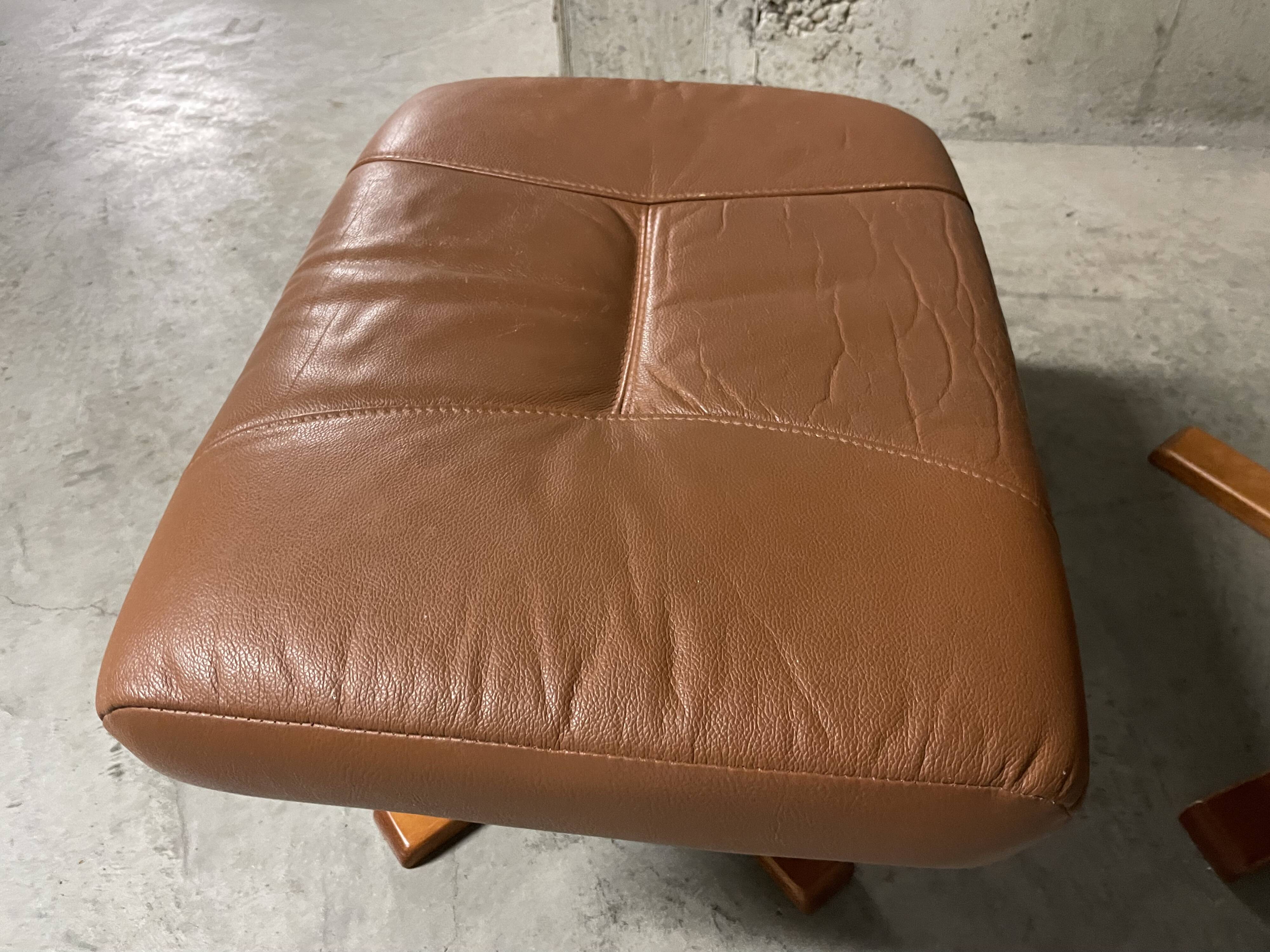 Unico leather armchair and ottoman