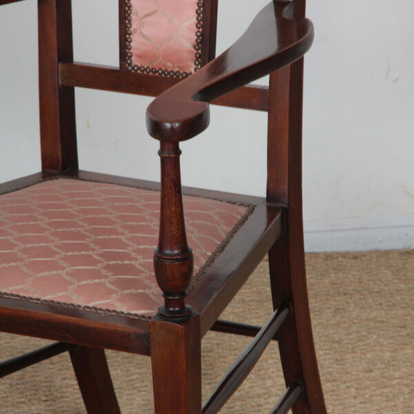 English armchair attributed to J.S. Henry, late 19th century.
