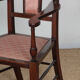 English armchair attributed to J.S. Henry, late 19th century.