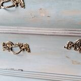 Curved patinated chest of drawers