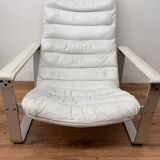 Pulkka armchair by Ilmaria Lappalainen and its ottoman