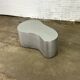 Table basse en acier inoxydable de forme organique