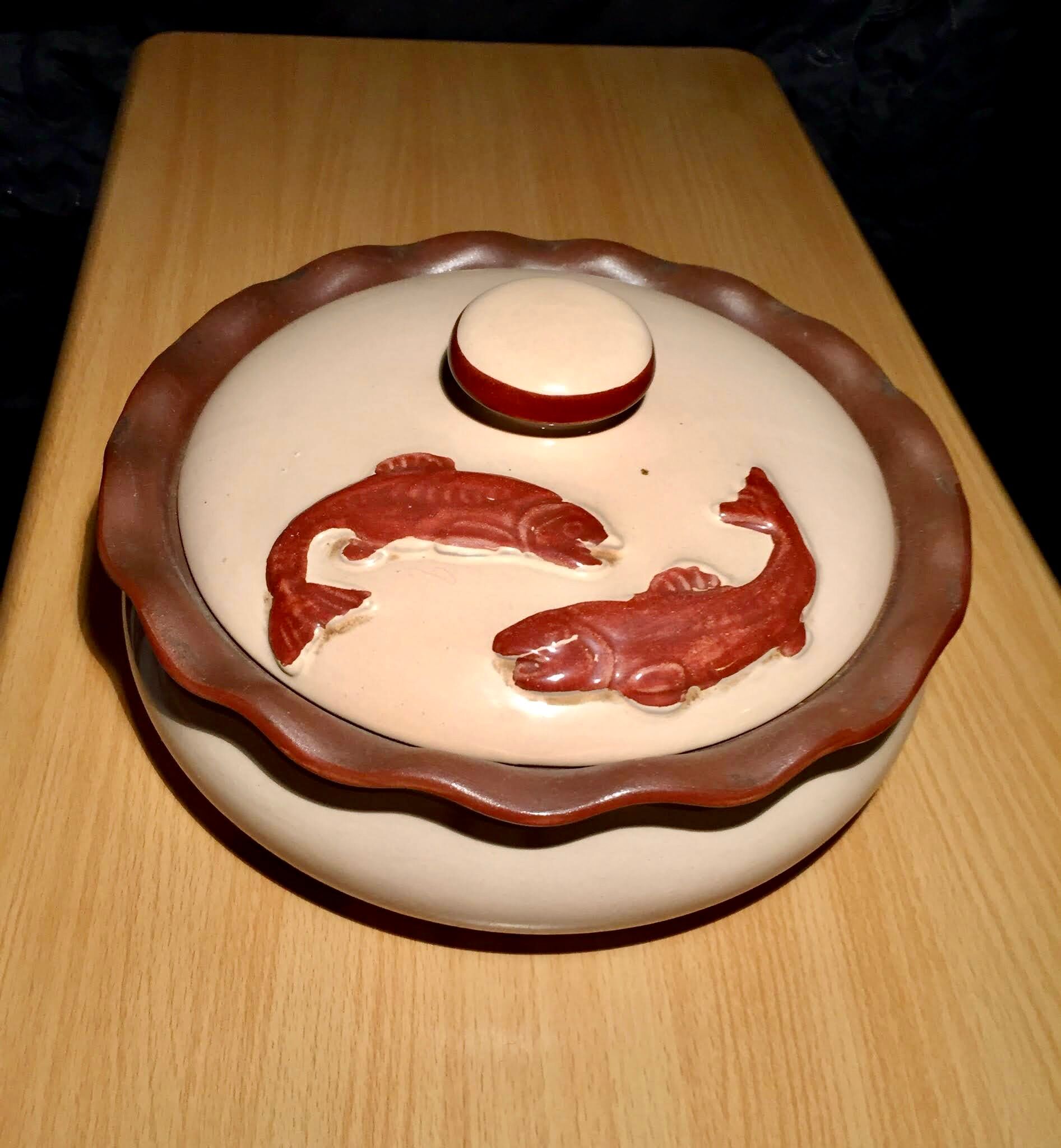 Bouillabaisse dish in terracotta fish decoration