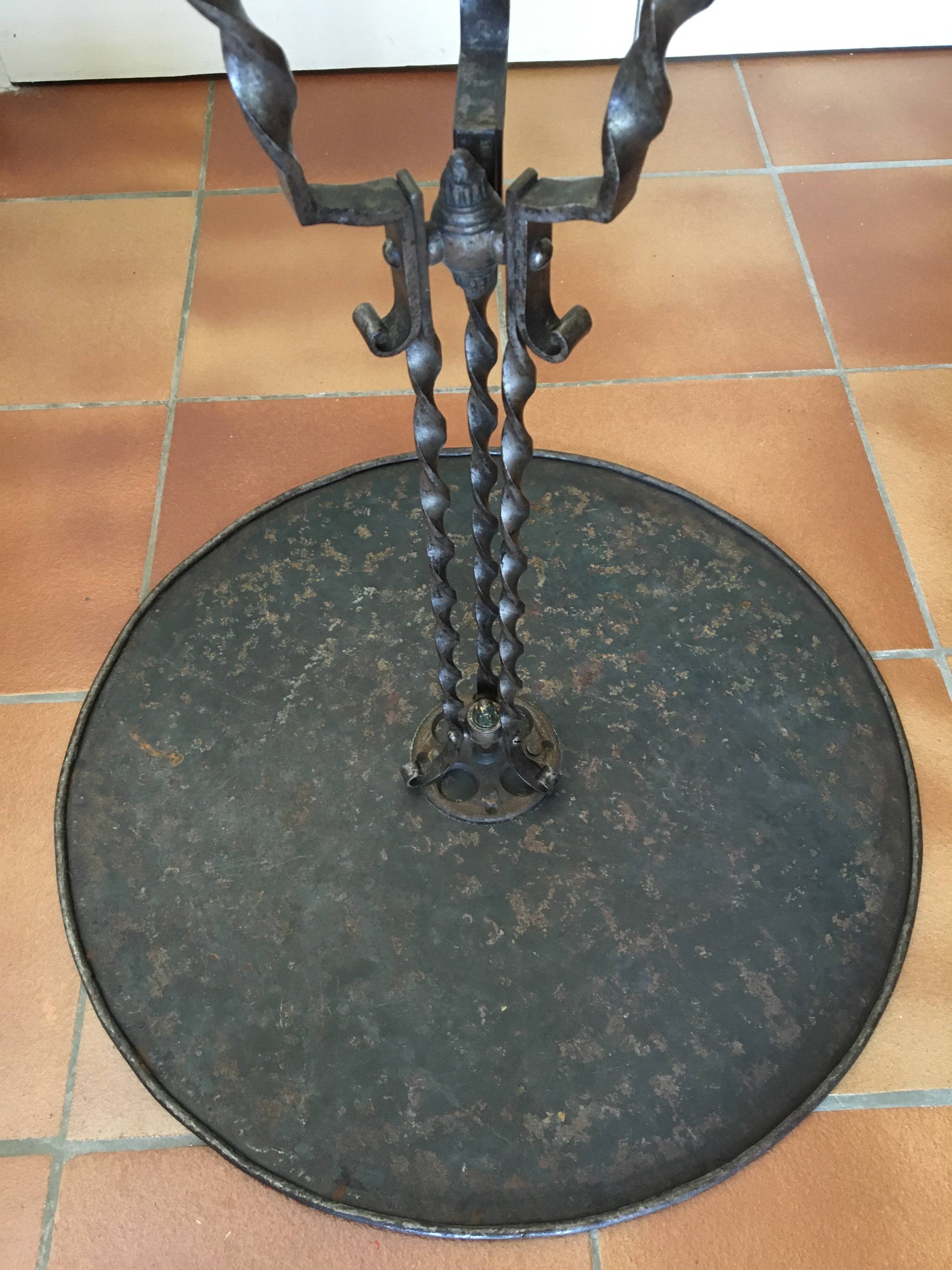 Round and antique metal side table