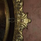 Miroir ovale en bois doré