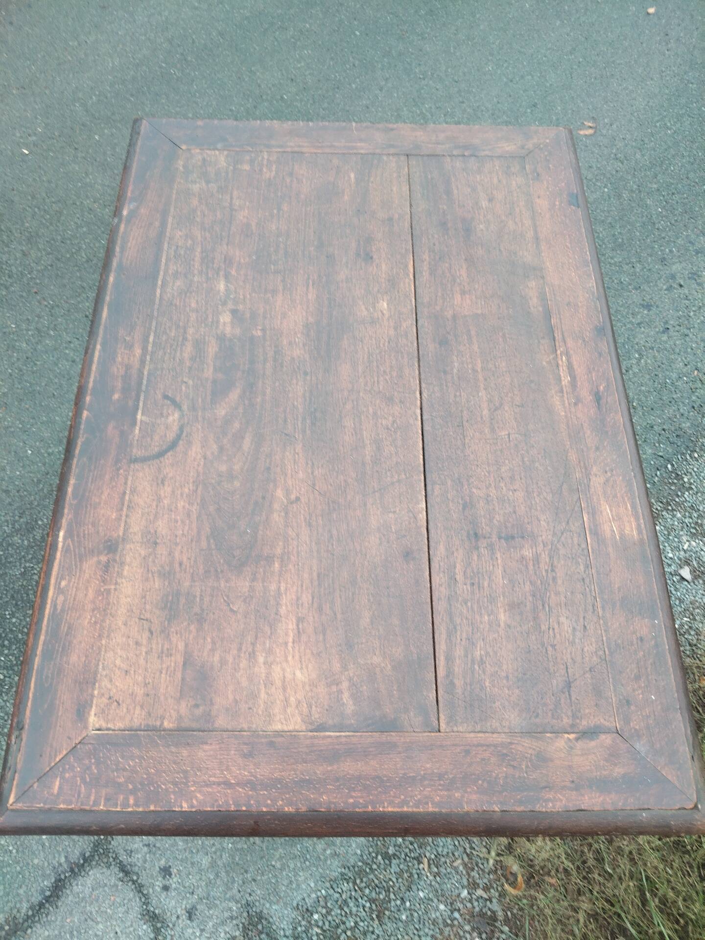 Small antique writing table in Louis XIII style made of oak.