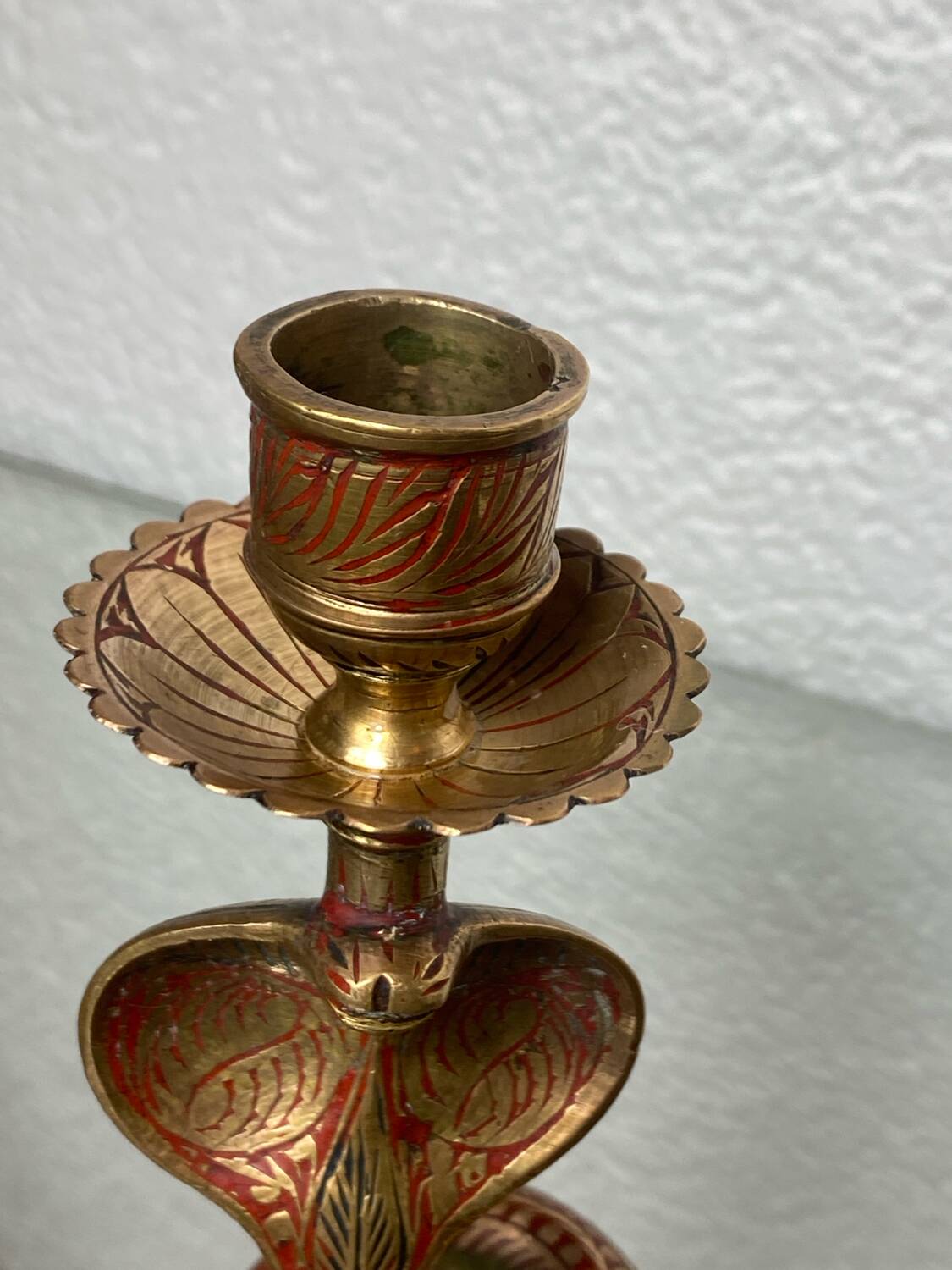 Chiseled brass cobra candlestick