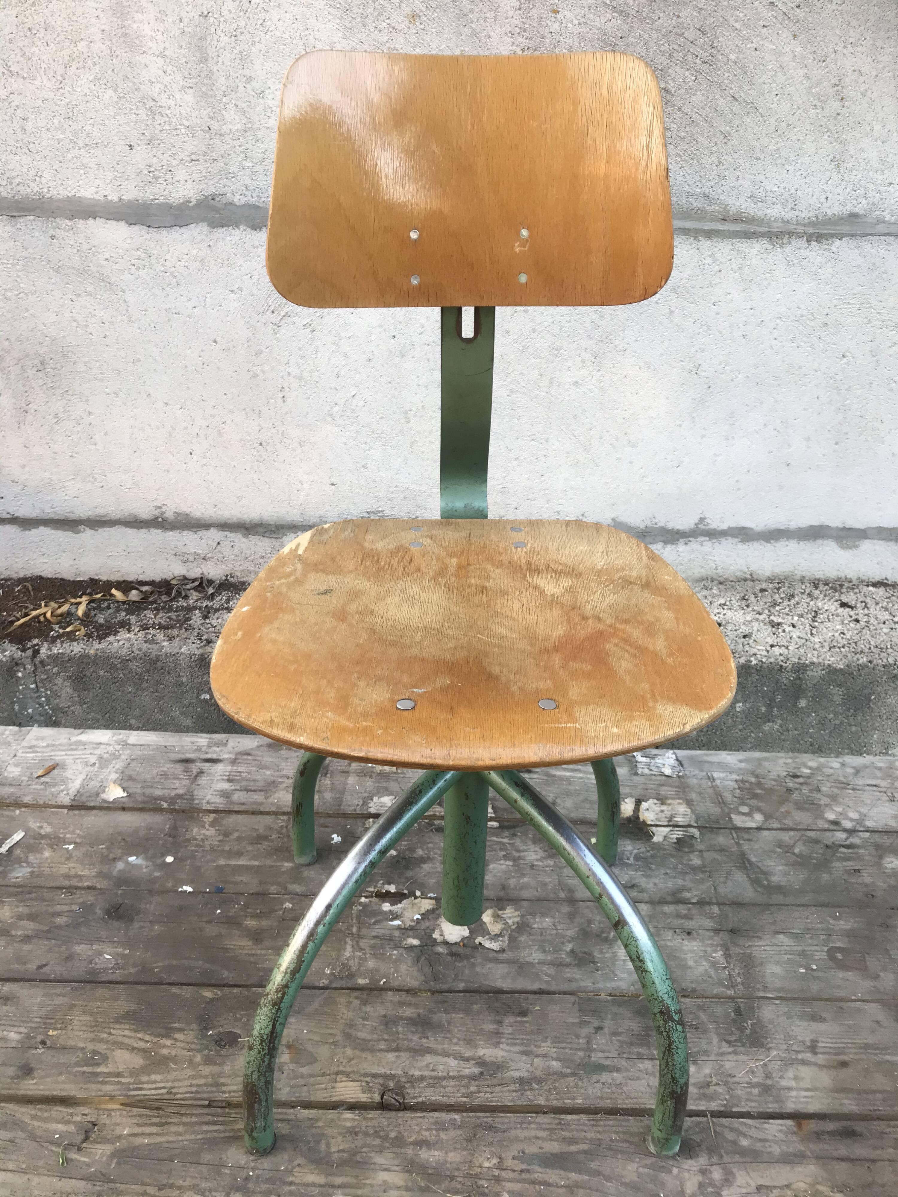 Former green metal workshop chair