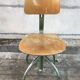 Former green metal workshop chair