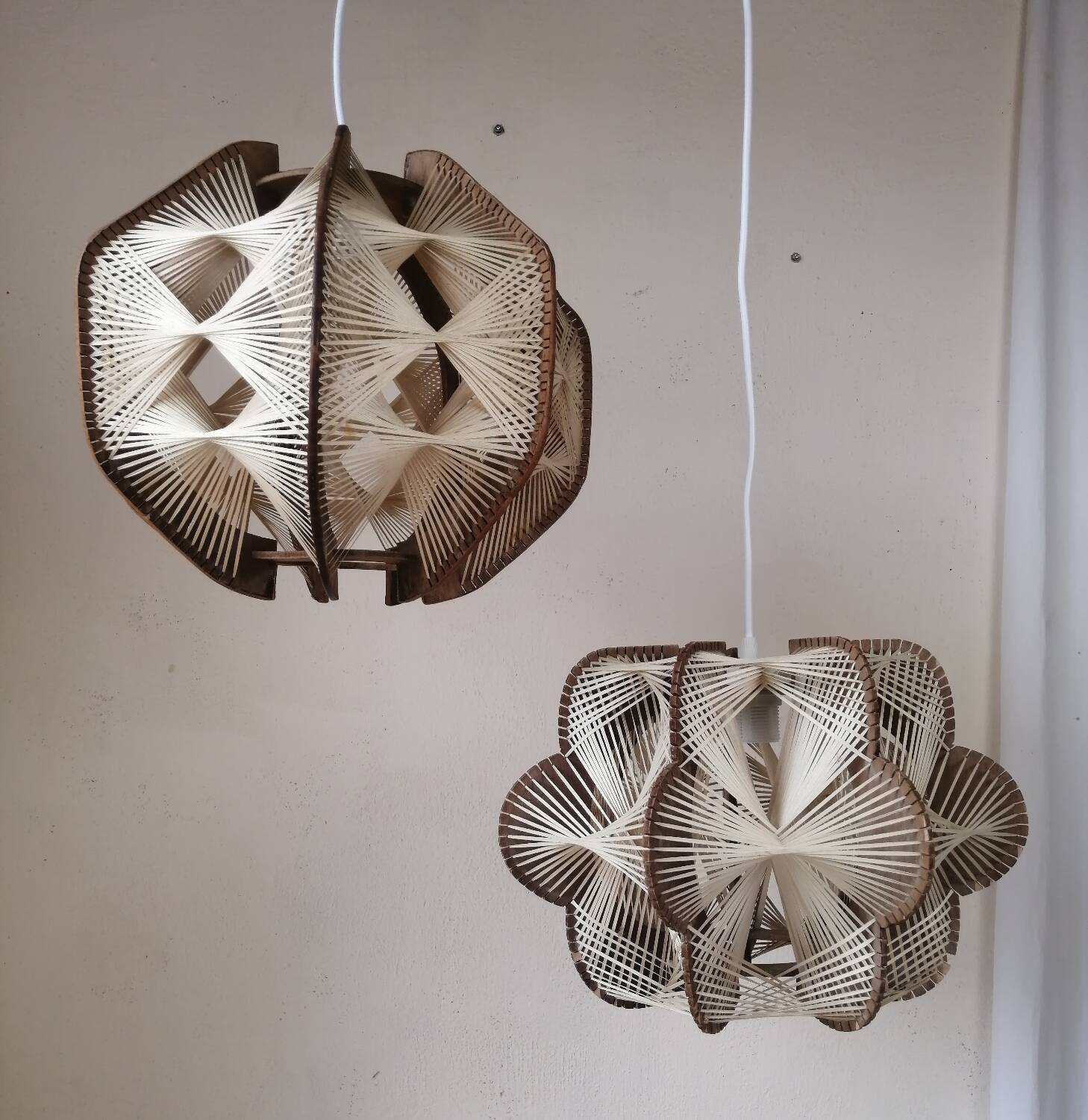 Pair of vintage wooden and rattan straw pendant lights.
