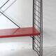 Tomado shelf in coloured metal floor shelves from 1958.