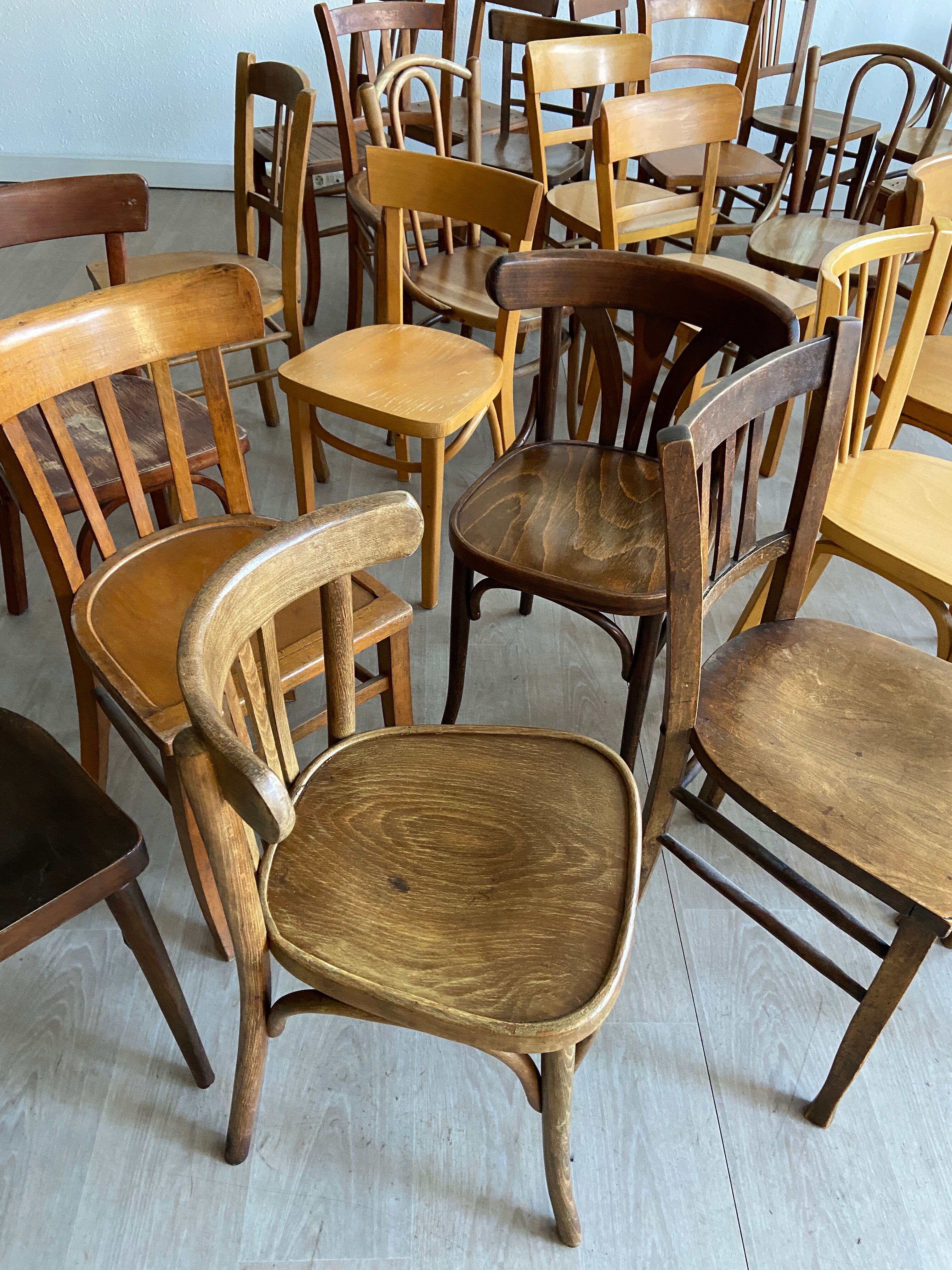 Set of 50 mismatched bistro chairs bentwood french Restaurant
