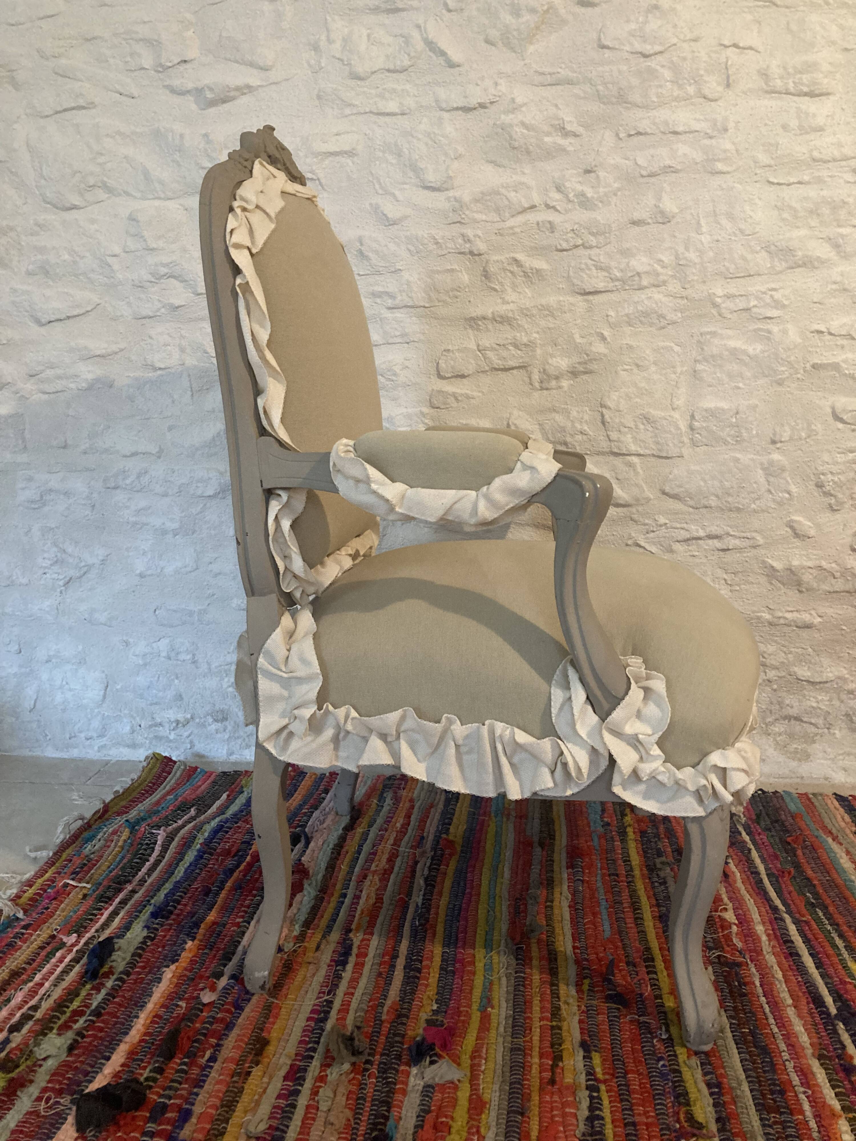 Frilly Regency style bergère armchair