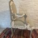 Frilly Regency style bergère armchair