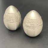 Egg-shaped metal salt and pepper shakers with Asian countryside motif