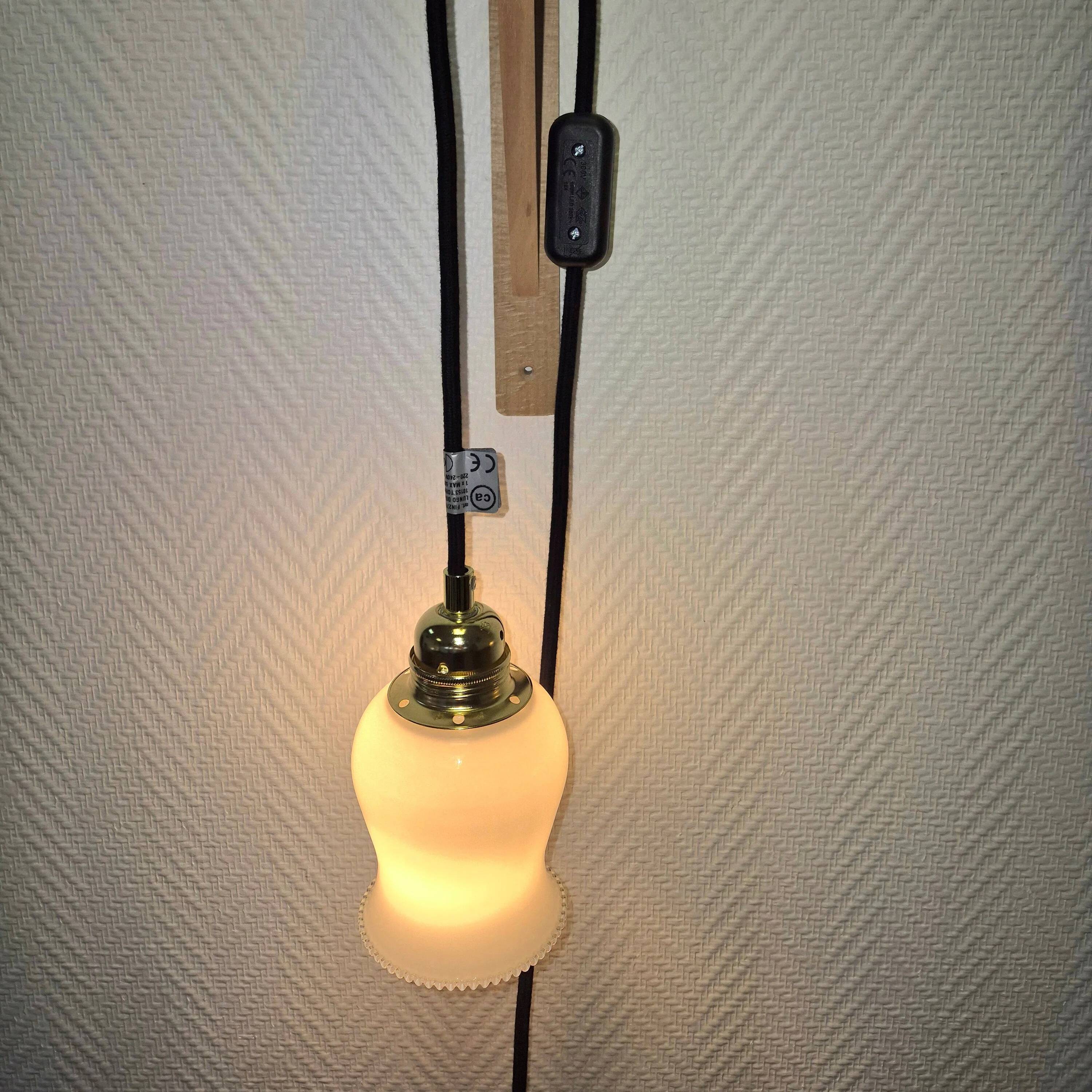 Suspended glass lantern in antique style