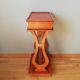 Pedestal table or English cherry saddle with lyre feet