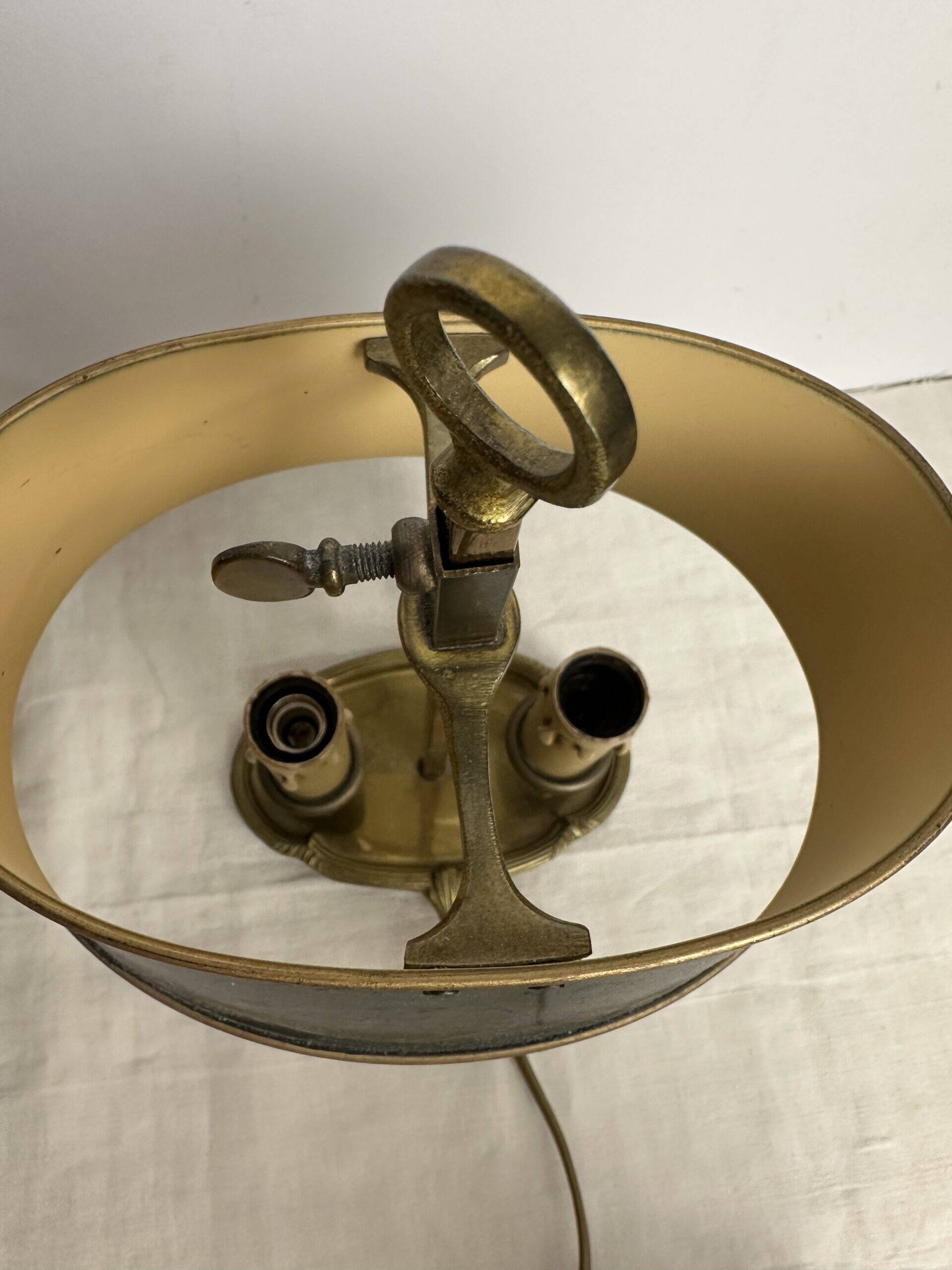 A pair of old brass bed warmers.