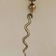 Pair of Neo-Egyptian Style Engraved Brass Wall Sconces Featuring Cobras
