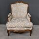 Queen's bergère in carved beech, Louis XV period – mid 18th century
