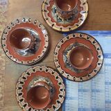 Set of etnic ceramic cups and plates