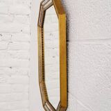 Octagonal mirror in Venetian style with gold-rimmed parecloses