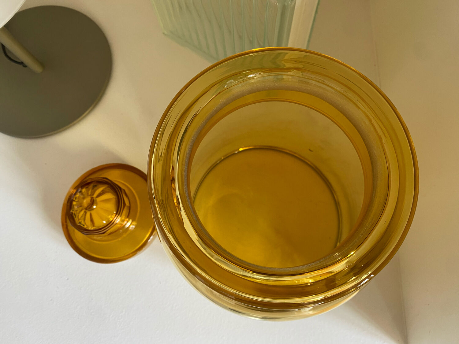 Old apothecary jar in blown amber glass