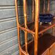 Rattan shelf with storage from the 1970s