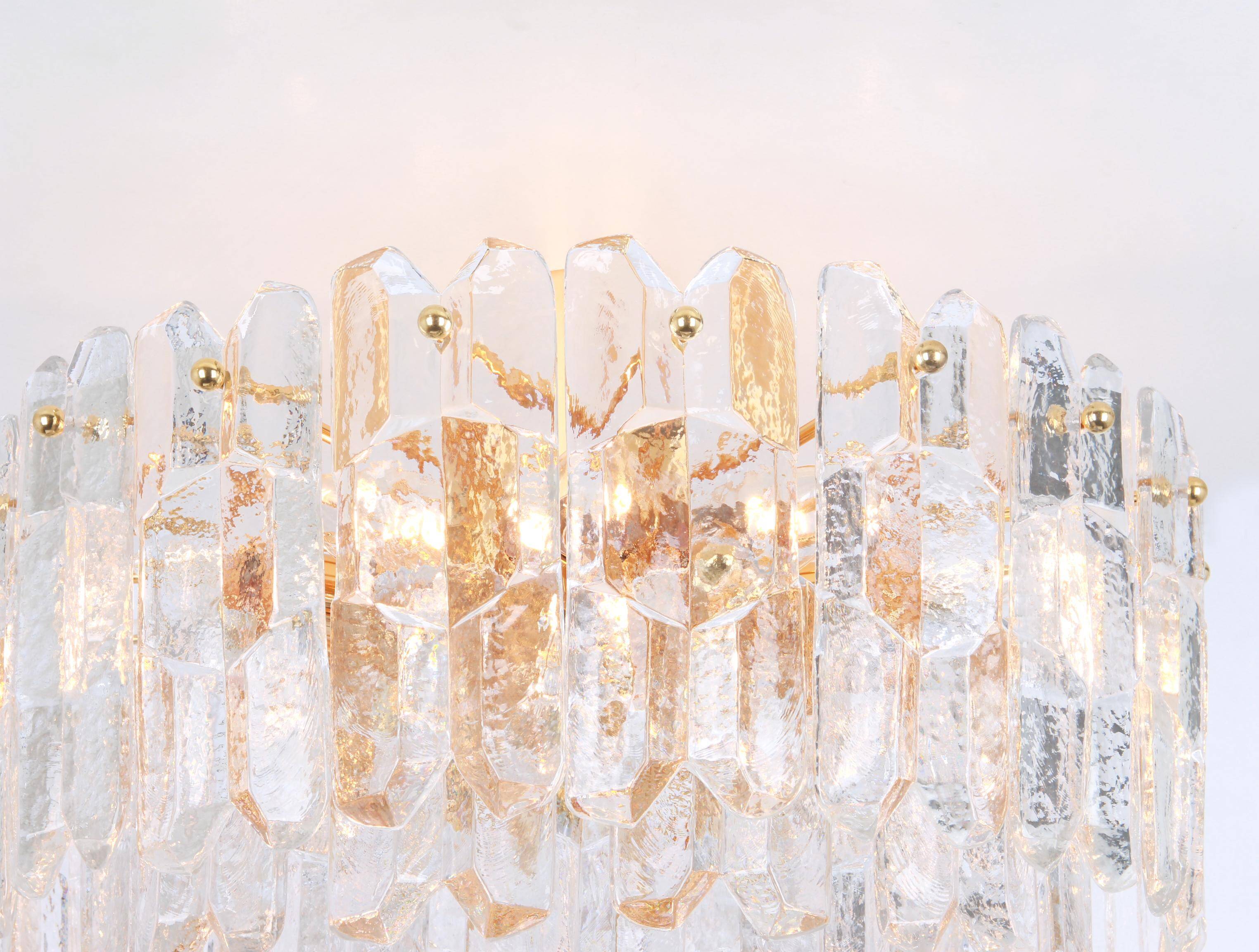 Magnificent luminaire in gilded brass and crystal glass Palazzo, Kalmar, Austria, 1970.