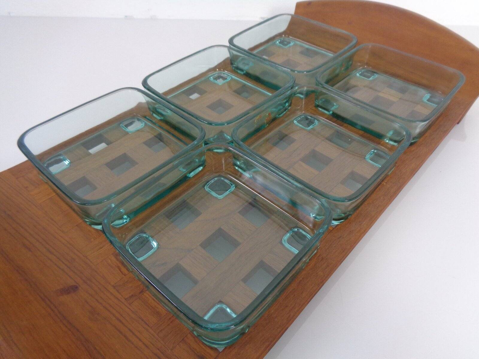 Teak tray with glass bowls by Jens Quistgaard for IHQ Dansk Designs, 1960s, set of 7.