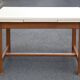 Wood and formica table with extensions