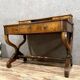 Empire period mahogany stepped desk with curule base circa 1810