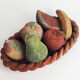 Basket and terracotta fruit