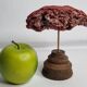 Antique Tubipora musica ornamental coral on wooden base, 16 cm