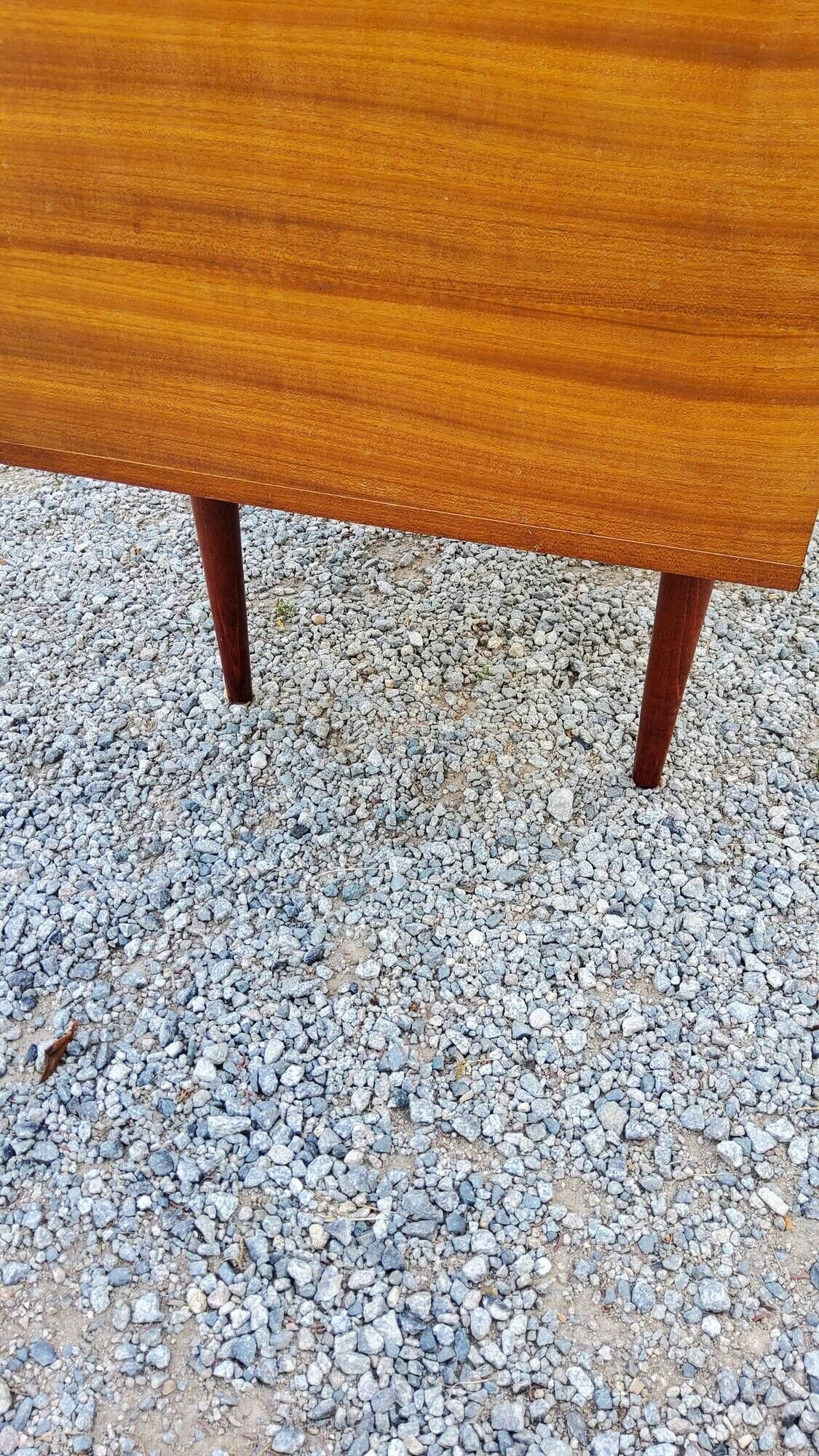 60s desk in golden blond mahogany with conical coffered feet