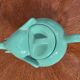Green vintage elephant teapot