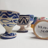 Lot of six enamelled ceramic cockroaches with Mediterranean themed decorations