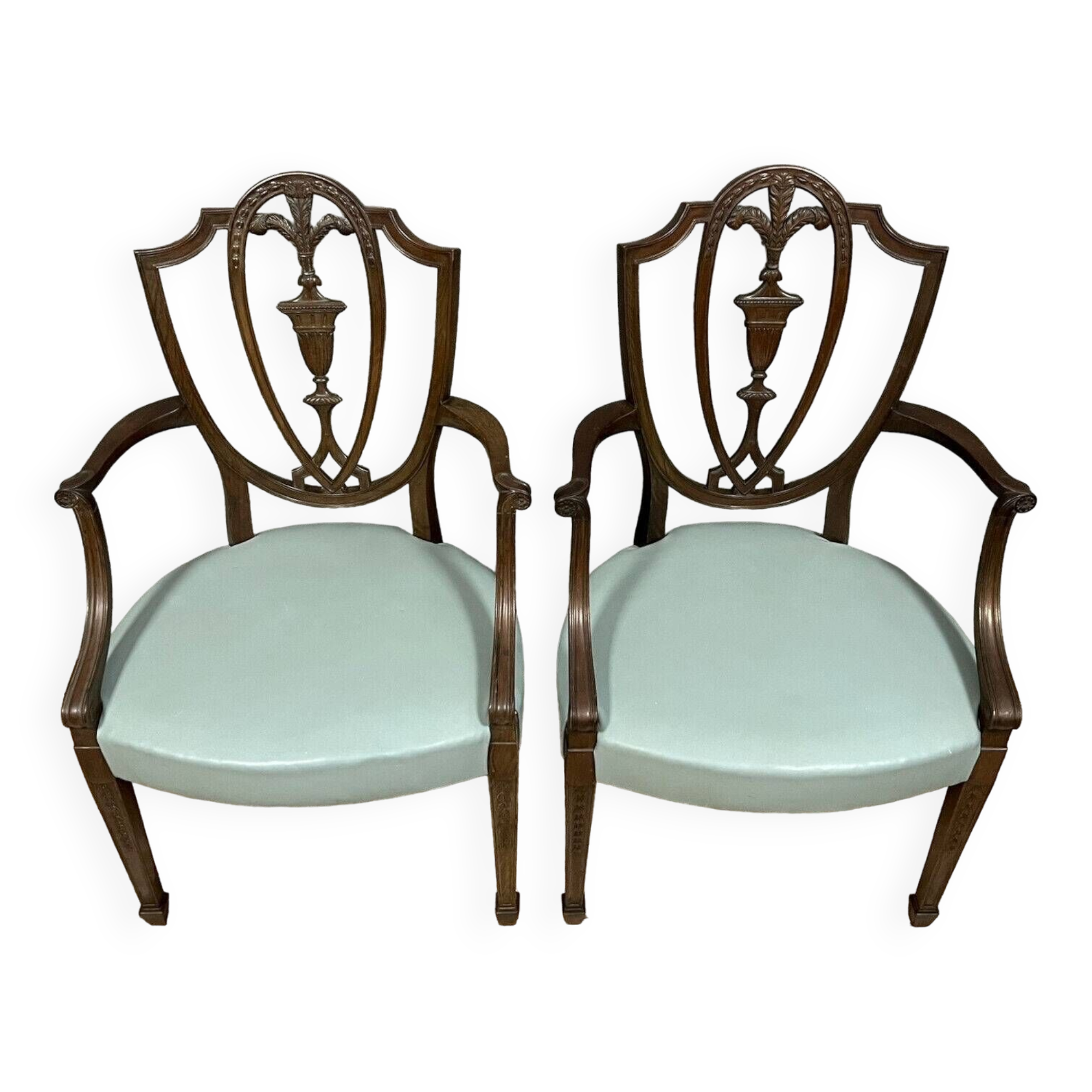 According to George Hepplewhite: pair of 19th century mahogany office armchairs