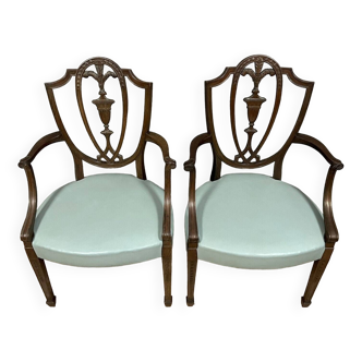 According to George Hepplewhite: pair of 19th century mahogany office armchairs