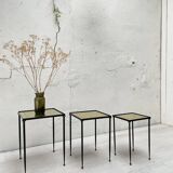 Suite of metal and glass nesting tables.