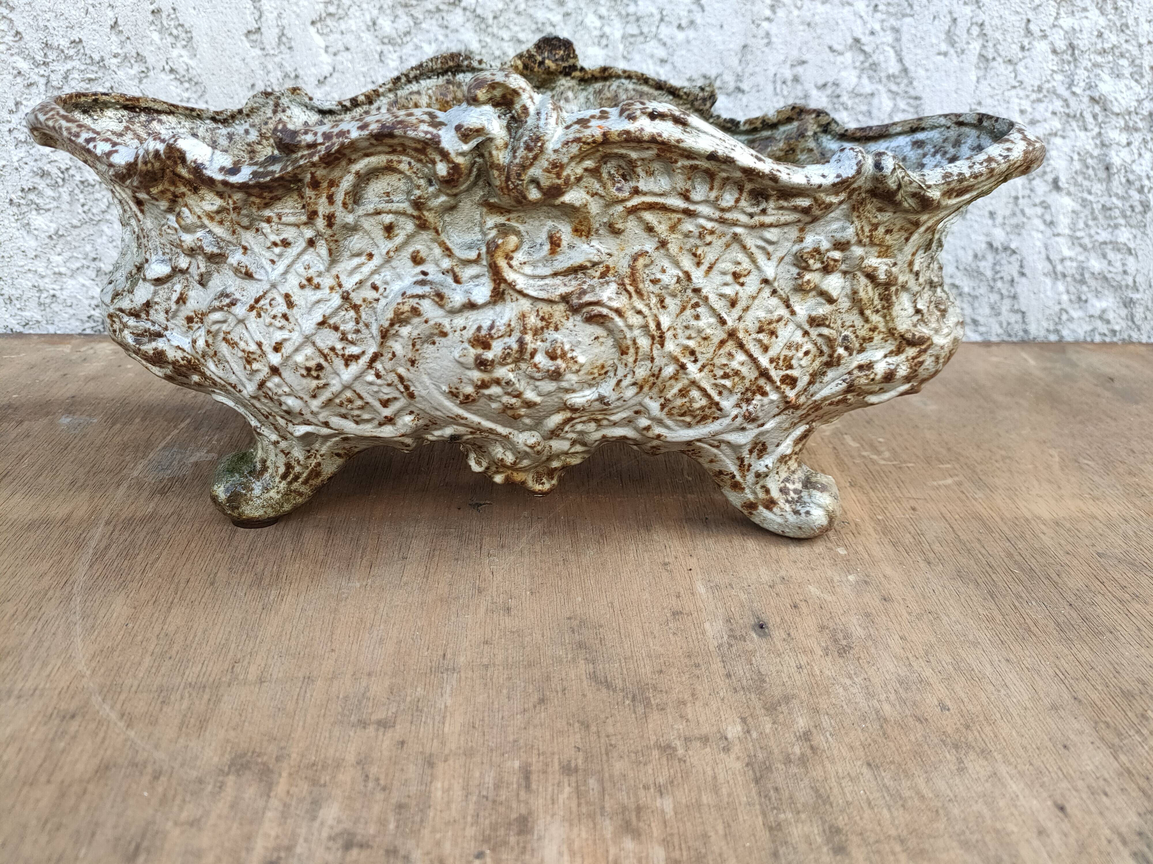 old cast iron planter