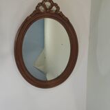 Antique oval mirror in carved wood – Louis XVI style, ribbon bow decoration, mid