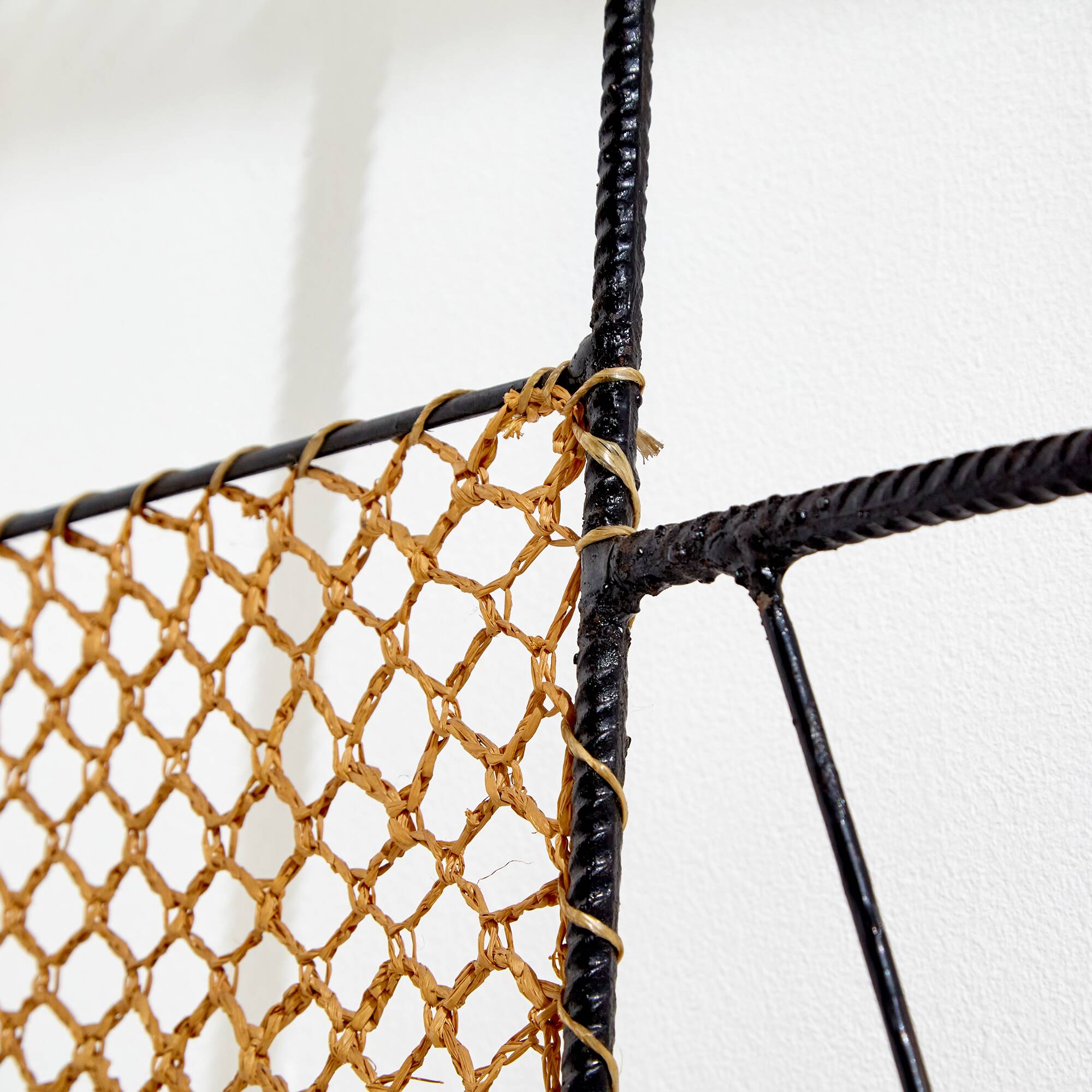 Rattan and metal coat rack