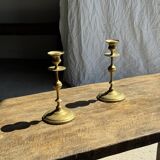 Pair of gilded candlesticks with engraved flower garland motifs H22