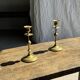 Pair of gilded candlesticks with engraved flower garland motifs H22
