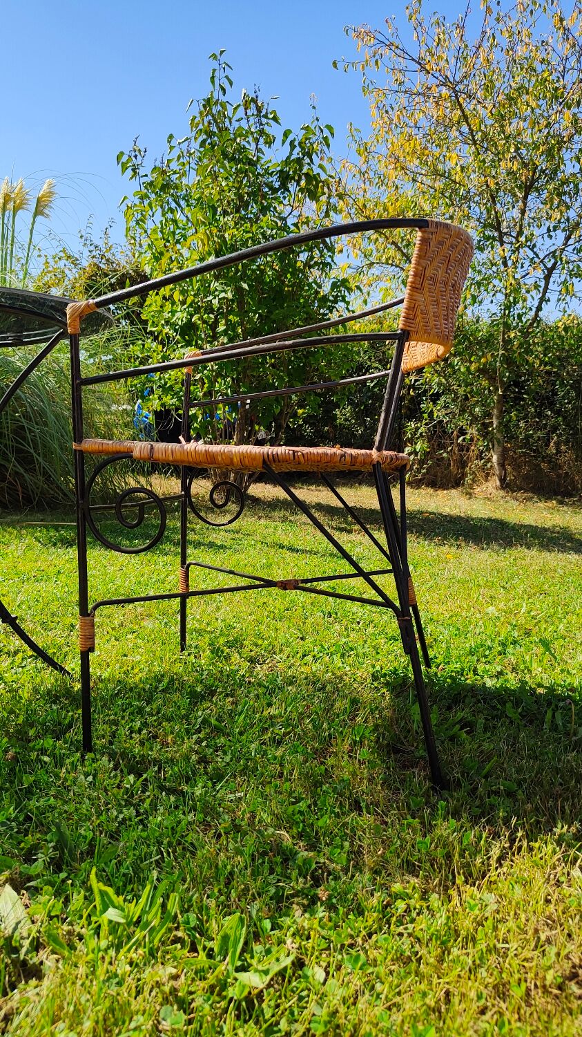 Garden table and wrought iron chair