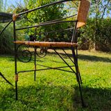Garden table and wrought iron chair