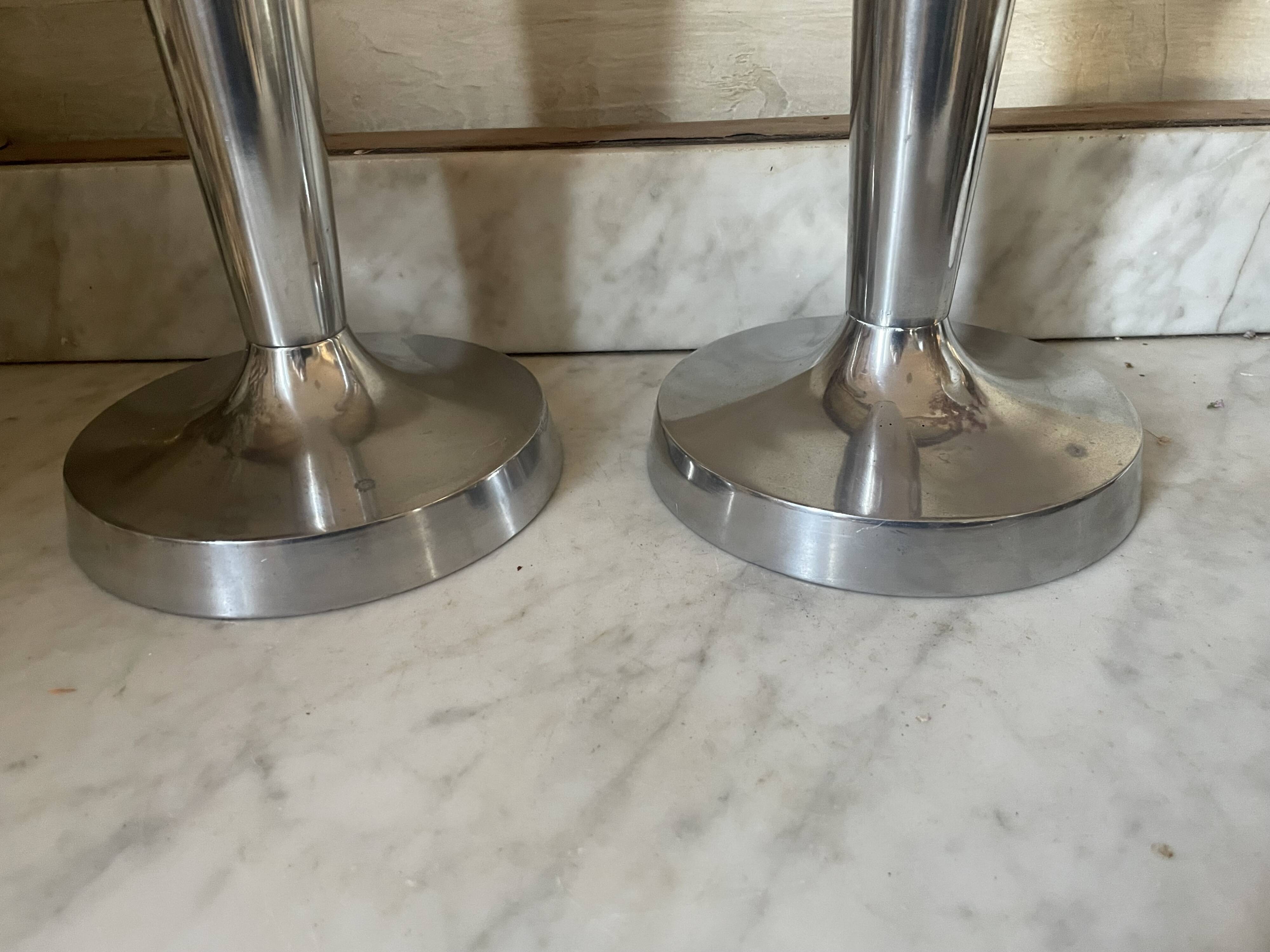 Pair of aluminium cast candle holders 52cm